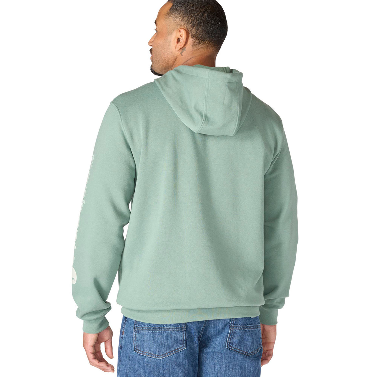 Man wearing a light green hoodie from behind on a white background
