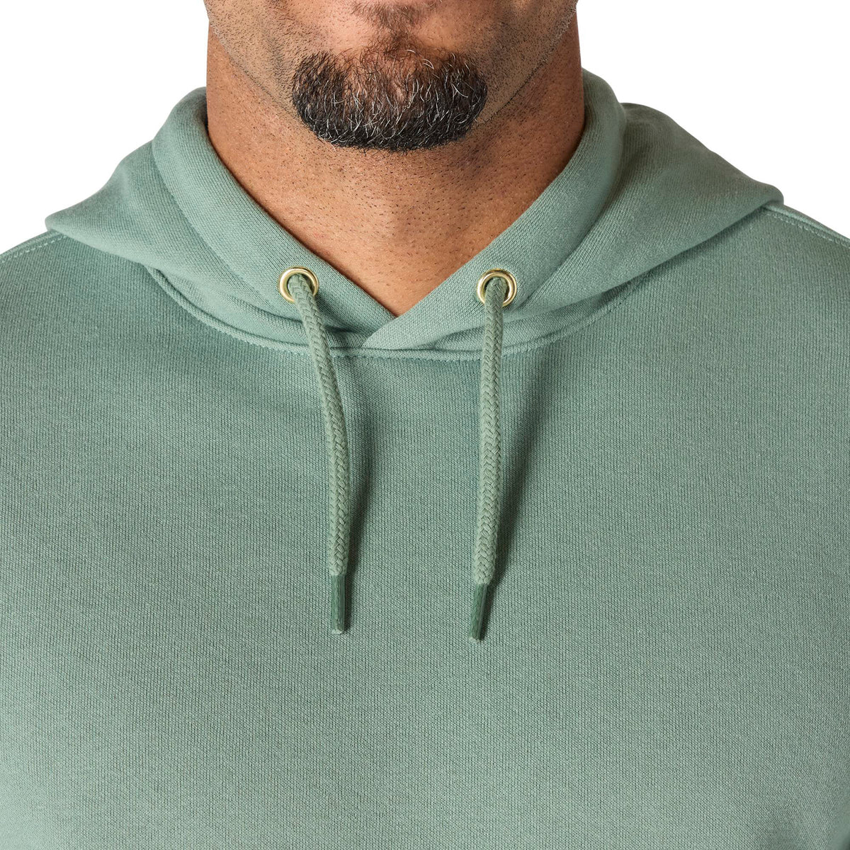 Green hoodie with a neutral background